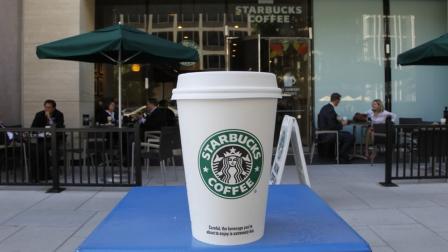 A large cup of Starbucks coffee sits outside a Starbucks in Washington, Wednesday, Sept., 15, 2010, (AP Photo/Pablo Martinez Monsivais)