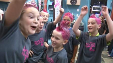 Boys dye their hair pink for Breast Cancer Awareness Month