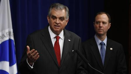 Rep. Adam Schiff, D-Calif., right, looks on as Transportation Secretary Ray LaHood gestures at the Transportation Department in Washington.