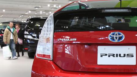 In this Jan. 8, 2010 file photo, Toyota Motor Corp.s Prius is on display at the automakers showroom in Tokyo.