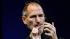 Apple CEO Steve Jobs uses the new iPhone during...