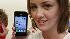 iPhone diehards show up in droves for latest... :: Suzi Tyler, of San Jose, Calif., holds up her new Apple iPhone 4 on the first day of sales, Thursday, June 24, 2010, at an Apple Store in Palo Alto, Calif. (AP Photo/Paul Sakuma)