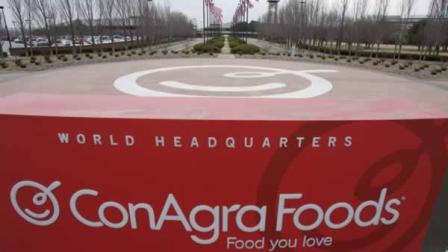 In this March 21, 2011 photo, a sign for ConAgras world headquarters is shown in Omaha, Neb. ConAgra Foods Inc.s fiscal third-quarter net income fell 6 percent Thursday, March 24, as the maker of Healthy Choice and Chef Boyardee dealt with rising costs.
