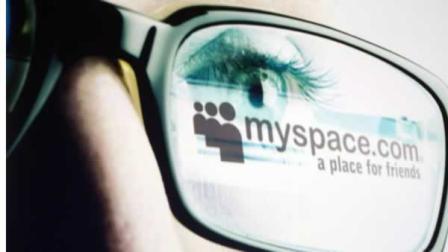 File photo of the MySpace logo through a mans reading glasses.