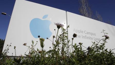 An Apple Inc. logo is displayed outside the exterior of Apple headquarters in Cupertino, Calif.