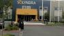 FBI agent in front of Solyndra headquarters