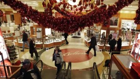 Shoppers walk through Macys in San Francisco, Wednesday, Dec. 1, 2010.
