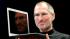 FILE - In this Jan. 15, 2008, file photo, Apple CEO Steve Jobs holds up the new MacBook Air after giving the keynote address at the Apple MacWorld Conference in San Francisco.