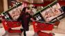 Target customer Nancy, last name not given, waits with televisions purchased at aTarget Store in Colma, Calif., Friday, Nov. 25, 2011.