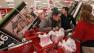 Nathan Chien, 19, center, and Jackie Lam, 18, second from right, pay for their televisions at the checkout of aTarget Store in Colma, Calif., Friday, Nov. 25, 2011.