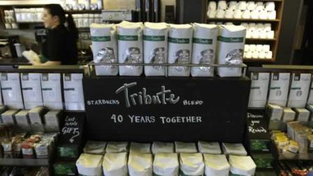 Bags of Starbucks Tribute blend coffee are shown bearing the new Starbucks Corp. logo, Tuesday, March 8, 2011, at a Starbucks store in downtown Seattle,