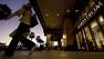 A customer walks out of Nordstrom in the Canoga Park section of Los Angeles.