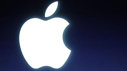 In this Tuesday, Oct. 4, 2011 file photo and Apple logo is seen during an announcement at Apple headquarters in Cupertino, Calif.