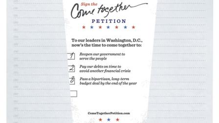 This image provided by Starbucks shows a petition the company is asking customers and businesses to sign, calling for an end to the partial government shutdown that has forced hundreds of thousands of federal workers off the job. The petition, which will be available at all Starbucks 11,000 U.S. locations to sign beginning Friday, calls for reopening the government, paying debts on time and passing a long-term budget deal by the end of the year. (AP Photo/Starbucks)
