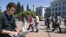 University of California, Berkeley law student Rob Glushko, from Suwanee, Ga., sits in a courtyard with his laptop on the UC Berkeley campus, Tuesday, Aug 22, 2006. (AP Photo/ Medill/News21,Jason Forman) 