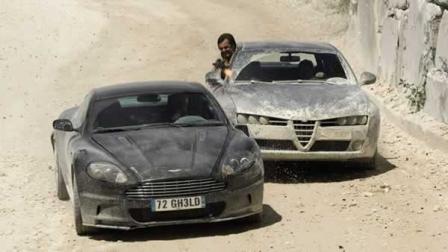 In this image made available by the auction house Christies made available Thursday Sept. 6, 2012 the James Bond Aston Martin being chased by an Alfa Romero in a scene from the James Bond film Quantum of Solace.