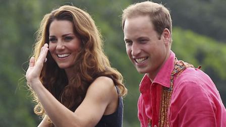 Britains Prince William and his wife Kate, the Duke and Duchess of Cambridge, smile as they watch a shark ceremony as they arrive at Marapa Island, Solomon Islands, Monday, Sept. 17, 2012.