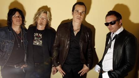 From left, Dean Deleo, Eric Kretz, Robert Deleo, and Scott Weiland, from the band Stone Temple Pilots, pose for a portrait in Santa Monica, Calif. on Friday, April 30, 2010. (AP Photo/Matt Sayles)