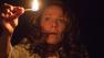 In this publicity image released by Warner Bros. Pictures, Lili Taylor portrays Carolyn Perron in a scene from The Conjuring.