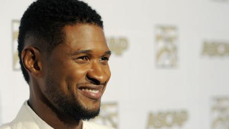 Usher, recipient of the ASCAP Golden Note Award, poses at the 26th Annual ASCAP Rhythm and Soul Music Awards at the Beverly Hilton Hotel on Thursday, June 27, 2013 in Beverly Hills, Calif. (Photo by Chris Pizzello/Invision/AP)