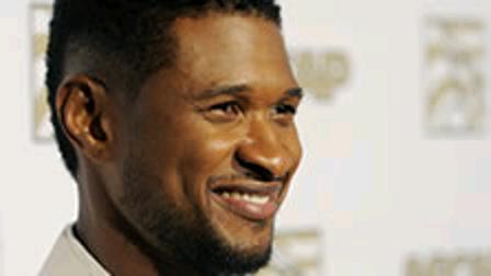 Usher, recipient of the ASCAP Golden Note Award, poses at the 26th Annual ASCAP Rhythm and Soul Music Awards at the Beverly Hilton Hotel on Thursday, June 27, 2013 in Beverly Hills, Calif. (Photo by Chris Pizzello/Invision/AP)