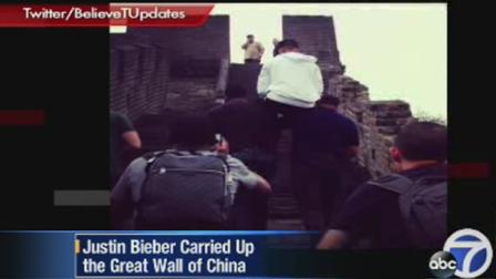 Justin Beiber being carried up Great Wall of China