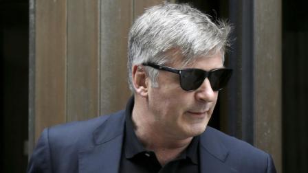 Actor Alec Baldwin leaves criminal court in New York, Tuesday, Nov. 12, 2013. Baldwin testified Tuesday that he never had a sexual or romantic relationship with Canadian actress Genevieve Sabourin, who accused of stalking him. He said that after they met, she began leaving dozens of voice mails for him a night and eventually started threatening to show up at his homes. (AP Photo/Seth Wenig)