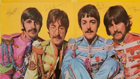 A pristine copy of The Beatles Sgt. Peppers Lonely Hearts Club Band album autographed by all four members of the band.