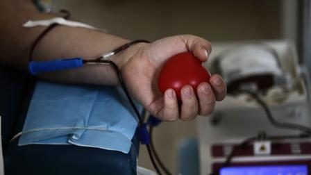 A man donates blood.