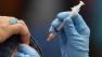 A flu shot is administered in Barre, Vt., Thursday, Nov. 18, 2004. Across Vermont on Thursday, 17 clinics will administer 12,000 flu vaccines to people at highest risk from the flu. (AP Photo/Toby Talbot) 