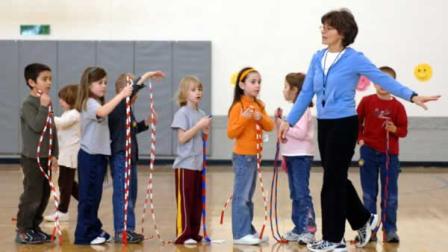 A file photo of children with a jump rope in gym class. (AP Photo/Tom Strickland, file)