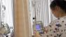 A nurse prepares a chemotherapy machine at the Cancer Institute of Singapore at the National University Hospital in Singapore, Wednesday April 18, 2007.