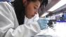 Interns working in labs