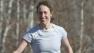 In this April 24, 2009 file photo, Heidi Hill, runs with her husband and daughters