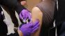 Officials are encouraging more of the public to get vaccinated as the flu becomes widespread across California.