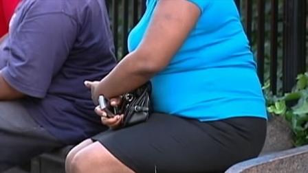 overweight woman sitting