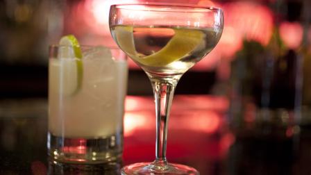An Agave Margarita and gin Martini made by mixologist Jacques Bezuidenhout sit on a bar in the Starlight Room of the Sir Francis Drake Hotel in San Francisco.