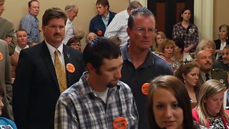 A controversial bill to ban the use of hounds in bear and bobcat hunting survived a state senate committee Tuesday.