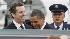 President Barack Obama laughs while being...