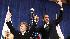 President Barack Obama waves with Sen. Barbara...