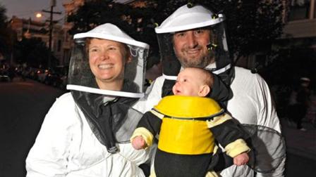 Rob, left, Patti, right, and Harper Lord, center, celebrate Halloween on Fair Oaks street In San Francisco, Saturday, Oct. 31, 2009. (AP Photo/Russel A. Daniels)