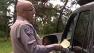 CHP officer writes a ticket for distracted driving