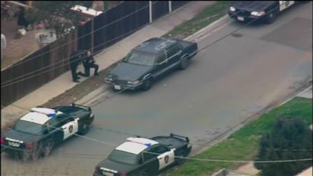 Pittsburg police inspect a vehicle abandoned by the suspects.