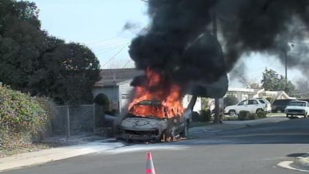 A pickup truck on fire
