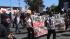 Around 100 people demonstrated on the streets of...