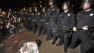 A demonstrator lies on ground in protest after the sentencing in Oakland, Calif., Friday, Nov. 5, 2010 of former Bay Area Rapid Transit police officer Johannes Mehserle.