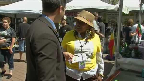 
Nurse and medical marijuana advocate Linda Jackson speaks with ABC7 reporter Sergio Quintana at the Cannabis and Hemp Expo in Oakland, Calif. Saturday, September 3, 2011.