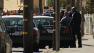 Oakland police have apprehended a burglary suspect who exchanged gunfire with officers Monday morning.