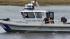 Police search for gun used in shooting rampage :: OPD boat