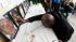 Classes at Oikos University resume today :: In an April 10, 2012 photo, Efanye Chibuko touches a picture of his wife Doris during a memorial at Oikos University in Oakland, Calif.